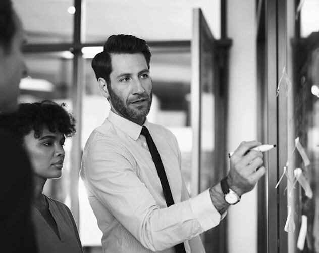 experienced leader writing on the board